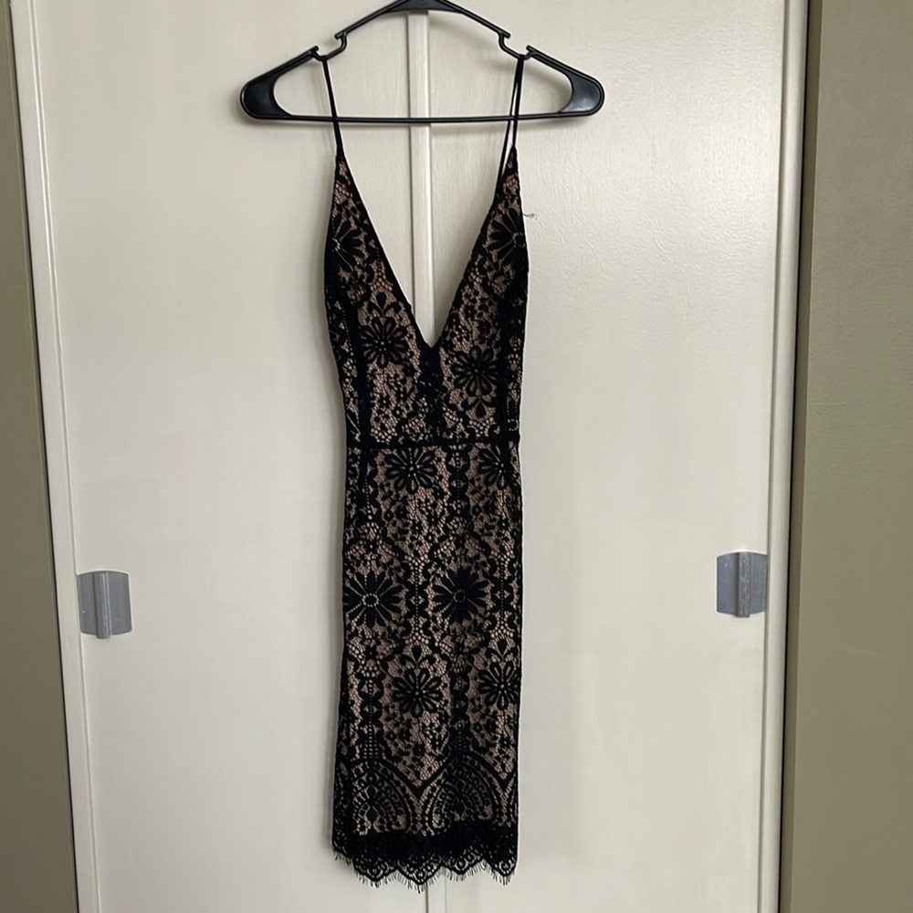 Black lace dress with nude underlay